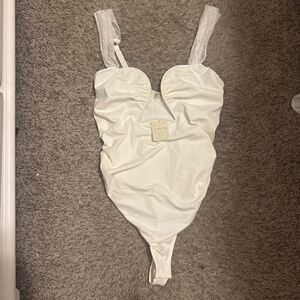 NWT free people bodysuit size large